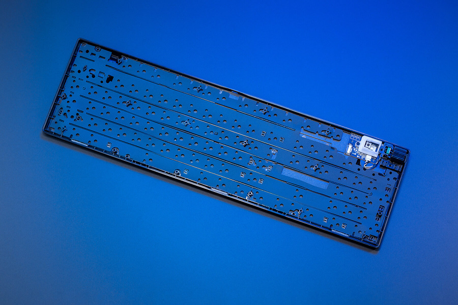 Open-up ROG Strix Scope II RX showing the built-in dampening foam